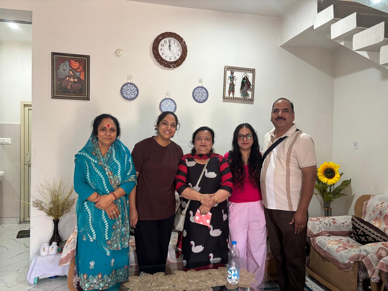 A visiting family with Bimla aunty in the dera living room